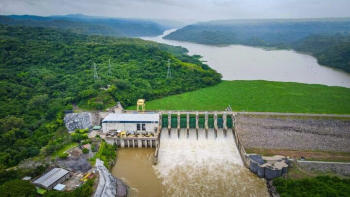 An aerial view of the state-owned 15 de Septiembre Hydroelectric Power Plant, the largest in El Salvador. The reservoir discharges when rainfall exceeds its storage capacity, causing the Lempa River to overflow and flood dozens of farming and fishing communities in the Bajo Lempa area. CREDIT: CEL