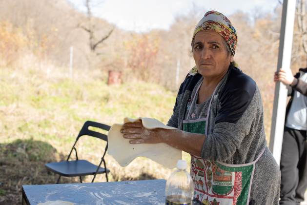 Romela Avanesyan prepares a traditional dish from Nagorno-Karabakh.  As winter approaches, these displaced people are dependent on both government and international assistance.  Credit: Gaiane Yenokian/IPS