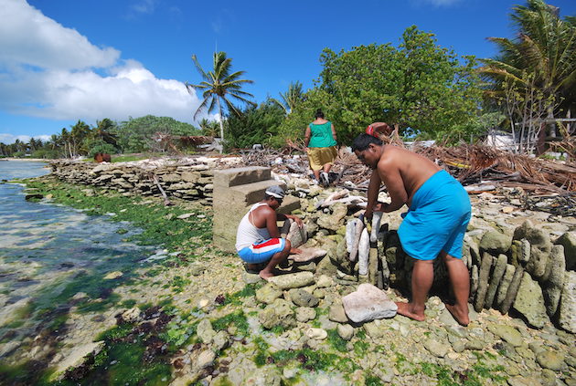 Coastal Community builds a seawall. The Pacific Community's Unlocking Blue Pacific Prosperity aims to conserve 1 billion hectares. Credit: Pacific Community
