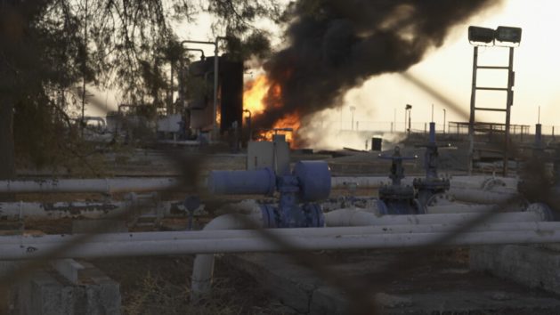 An oil production field near Rumilan, in Syria´s northeast, shortly after being hit by Turkish drones. Oil is one of the main sources of income for the entire Kurdish region. Credit: Jewan Abdi/IPS