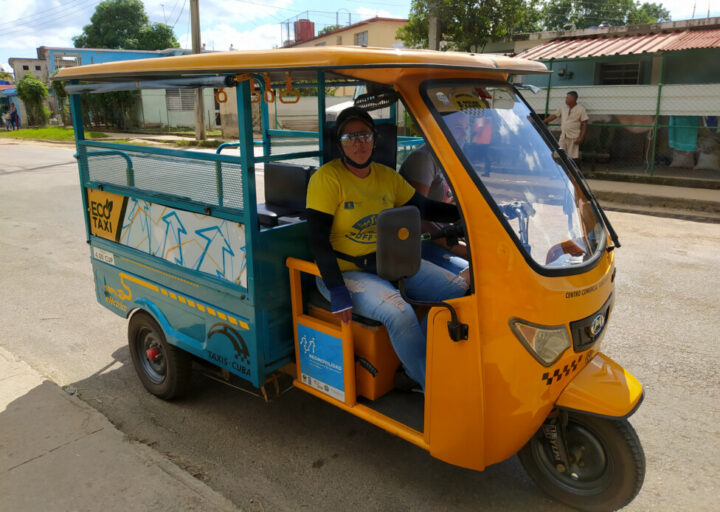 Electric three-wheelers or ecotaxis help alleviate transportation problems in the municipality of Boyeros, one of the 15 that make up the Cuban capital. CREDIT: Jorge Luis Baños / IPS