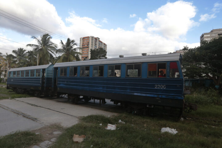 A train travels along a railroad track in Cuba's capital. A majority of the population depends on the public transportation system, based mainly on buses, trucks and trains, which consume fossil fuels. CREDIT: Jorge Luis Baños / IPS