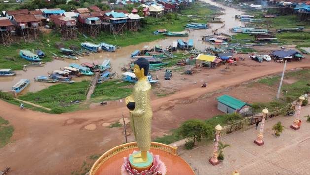 A Buddha statue keeps watch over the village of Kampong Khleang. Credit: Kris Janssens/IPS
