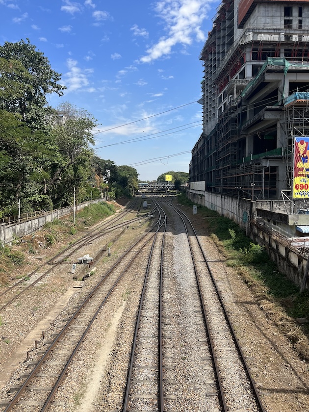 Empty rail tracks in central Yangon. Fewer trains are running in Myanmar because rail workers quit in protest at the 2021 coup, and resistance fighters are targeting lines and trains used by the military up and down the country. Credit: William Webb/IPS