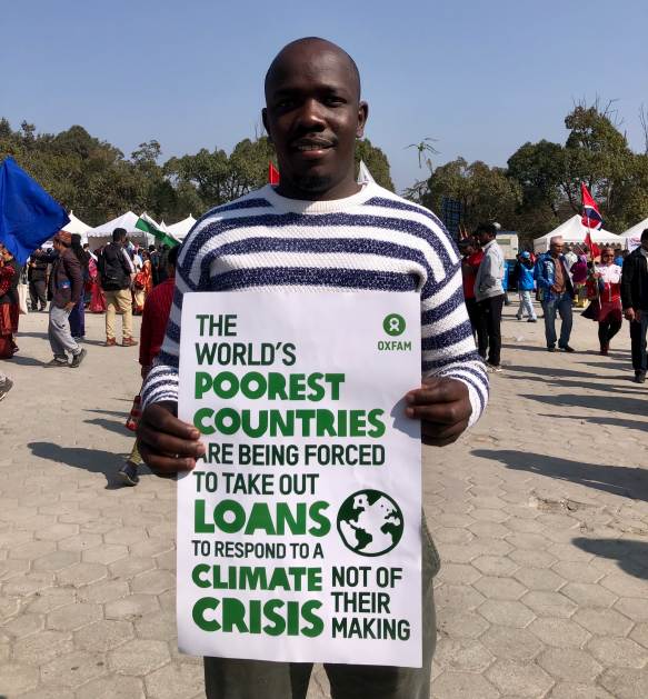 Kenyan youth climate activist Kiprotich Peter calls for grants instead of loans, for countries grappling with climate-induced crises at the World Social Forum in Kathmandu on 16 February 2024. Credit: Tanka Dhakal / IPS