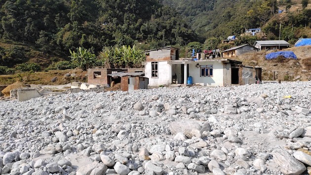 Melamchi-Helambu flood impacted houses and farm field which is affecting livelihood. Credit: Tanka Dhakal/IPS