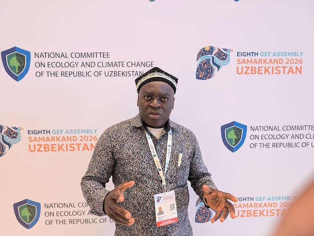 Tumaini Charles Marijani, Regional Focal Point for the GEF Civil Society Organisation Network, gestures during an interview with IPS on the sidelines of the GEF Assembly in Samarkand, Uzbekistan. Credit: Kizito Makoye/IPS