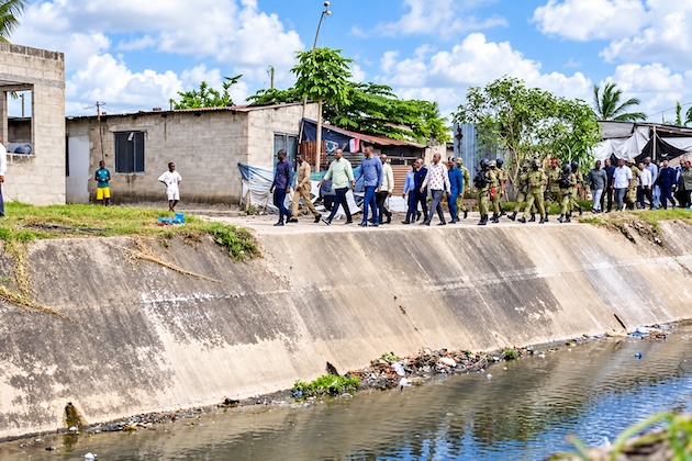 Tanzania’s vice-president inspects a drainage channel in Dar es Salaam as authorities step up preparations for heavy El Niño rains expected during the October–December rainy season. Credit: Kizito Makoye/IPS
