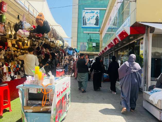 Afghan women journalists face growing barriers to reporting as a smartphone ban in government offices restricts access to official sources.