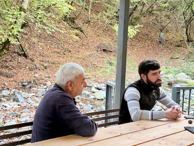 Vladik Agatelyan and Harut Marzynyan talk about the impacts of war on the locals’ livelihood and wildlife. Credit: Stella Paul/IPS